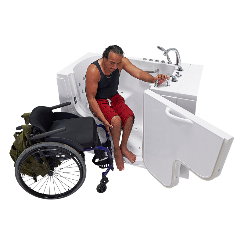Man in wheelchair transferring into a walk-in tub with open door