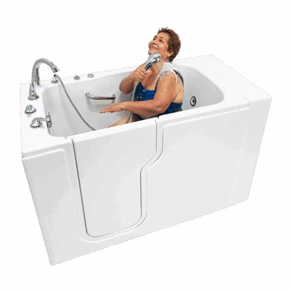 Smiling senior woman using a walk-in tub with outward swinging door