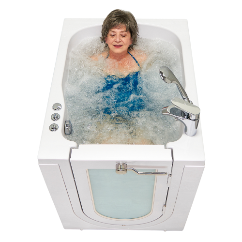 Elderly woman enjoying hydrotherapy in a walk-in bathtub with clear door