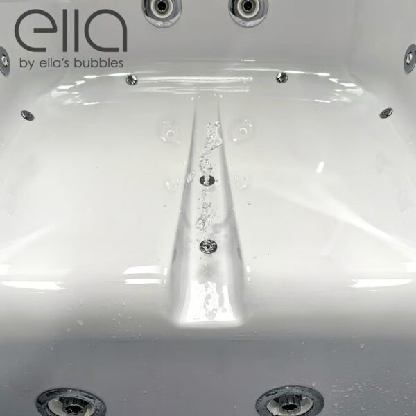 auto purge system flushing water from air jet lines inside white walk in tub