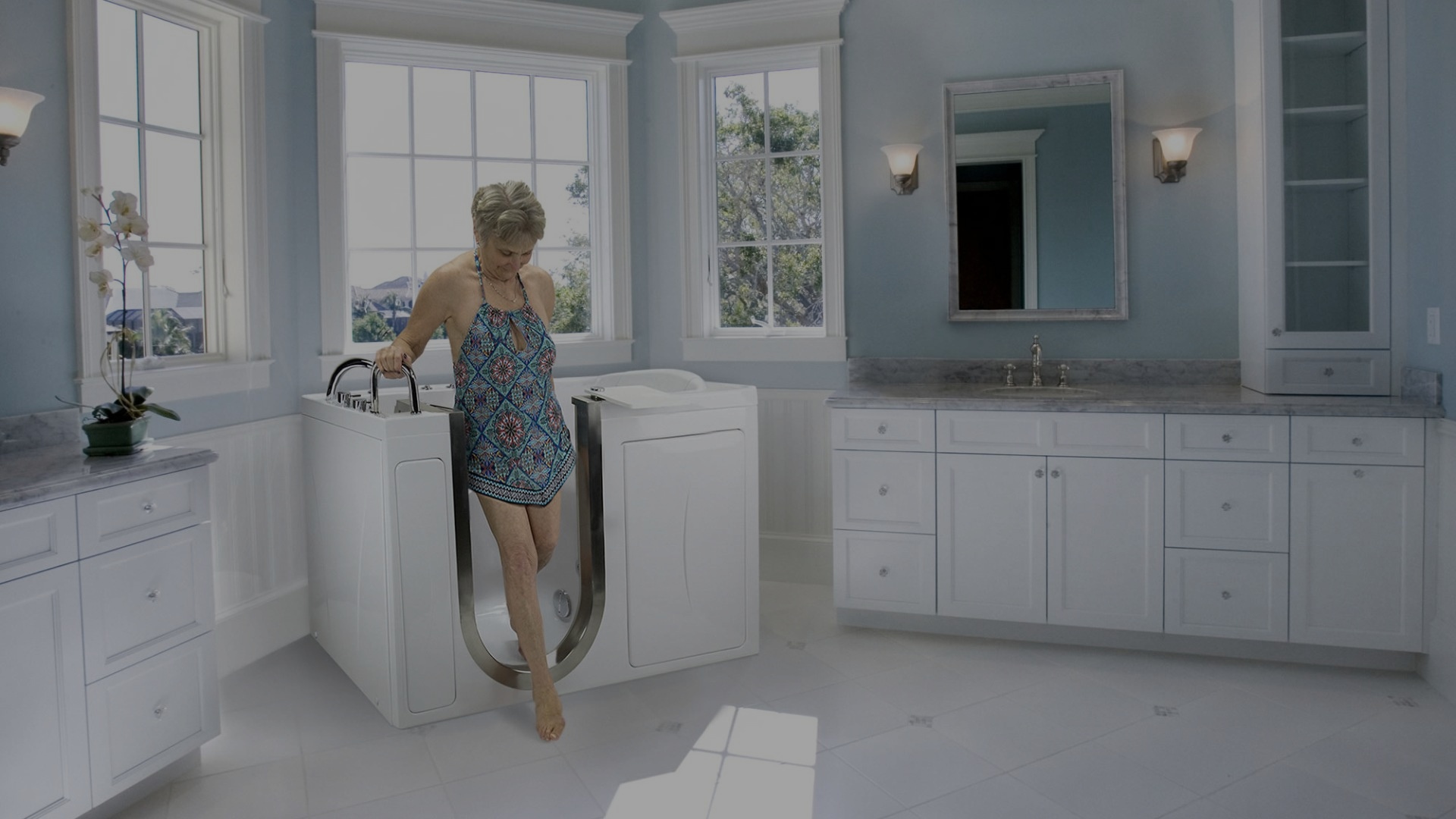 walk-in-tub-elderly-woman-modern-bathroom-black